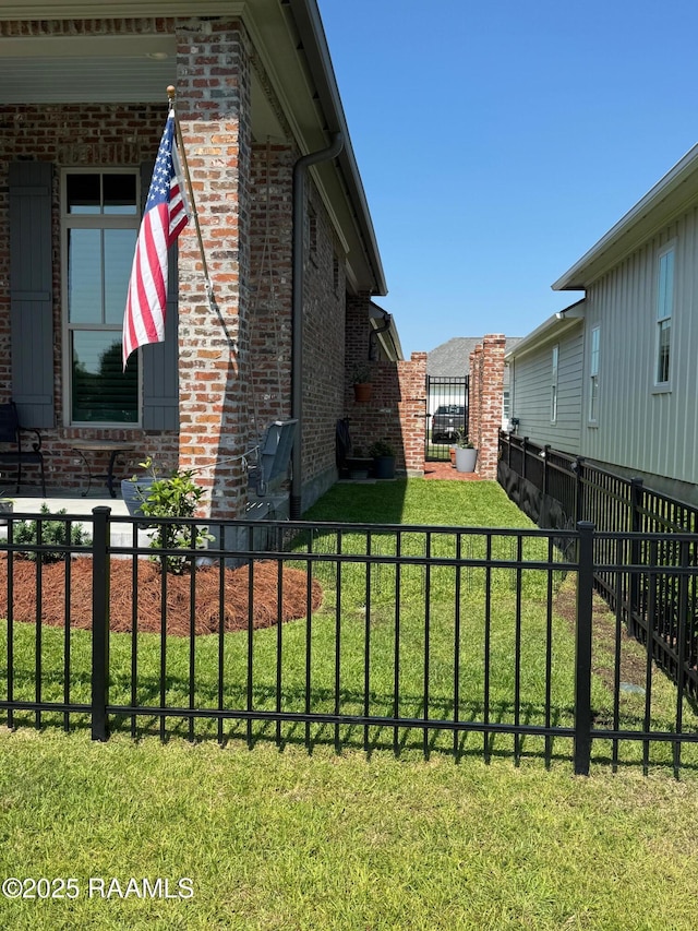 311 Villager Ave Unit C, Scott, LA 70583 - view of property exterior featuring brick siding