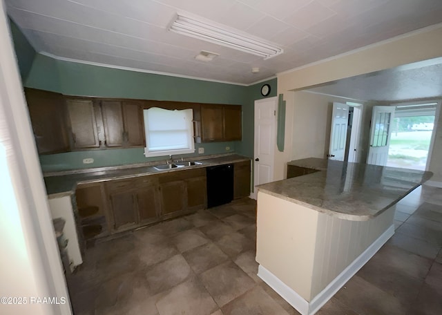 1101 Portage Rd, Arnaudville, LA 70512 - kitchen with black dishwasher, crown molding, and brown cabinets