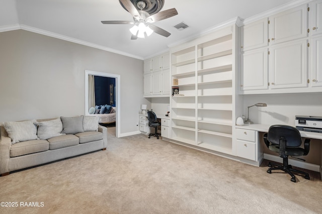 303 Duperier Ave, New Iberia, LA 70563 - office area featuring built in study area, ceiling fan, light carpet, crown molding, and baseboards
