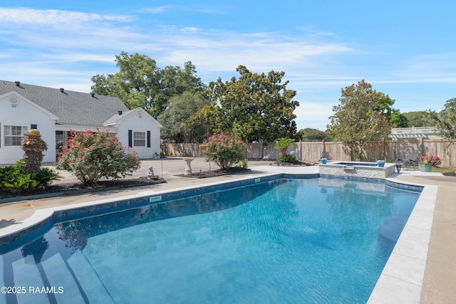 303 Duperier Ave, New Iberia, LA 70563 - view of swimming pool featuring a patio area, a fenced backyard, and a pool with connected hot tub