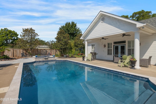 303 Duperier Ave, New Iberia, LA 70563 - view of pool featuring french doors, a ceiling fan, a fenced backyard, a patio, and grilling area