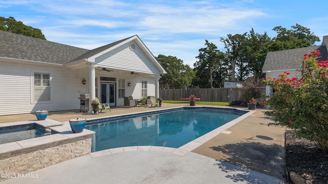 303 Duperier Ave, New Iberia, LA 70563 - view of pool with an in-ground hot tub, ceiling fan, a fenced backyard, a patio area, and french doors