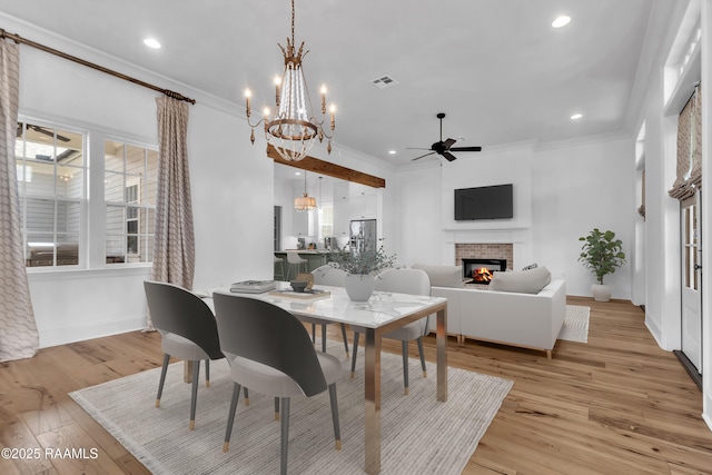 3132 Veranda View Ave, Baton Rouge, LA 70810 - dining space featuring a fireplace, a ceiling fan, ornamental molding, recessed lighting, and baseboards