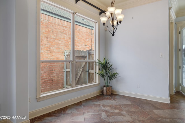 109 Flamingo Row, Lafayette, LA 70508 - unfurnished dining area featuring a chandelier, ornamental molding, and stone finish flooring