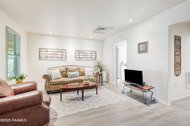 531 Silver St, New Iberia, LA 70560 - living area featuring light wood-style flooring and recessed lighting