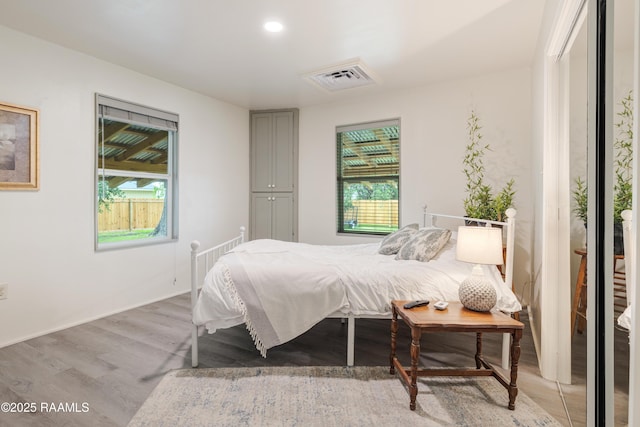 531 Silver St, New Iberia, LA 70560 - bedroom with light wood-style flooring