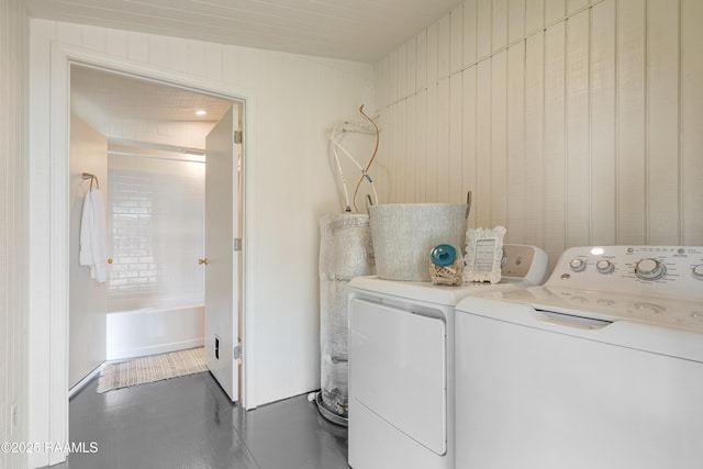 531 Silver St, New Iberia, LA 70560 - laundry room featuring washer and clothes dryer and water heater