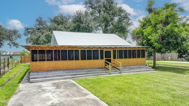 531 Silver St, New Iberia, LA 70560 - rear view of house featuring a metal roof