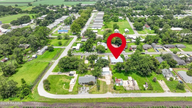 531 Silver St, New Iberia, LA 70560 - aerial view of residential area featuring a tree filled landscape