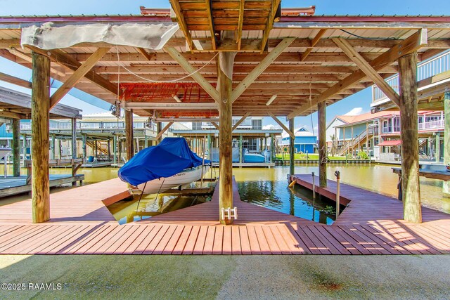 178 Flounder Ct, Dulac, LA 70353 - dock area with boat lift and a water view