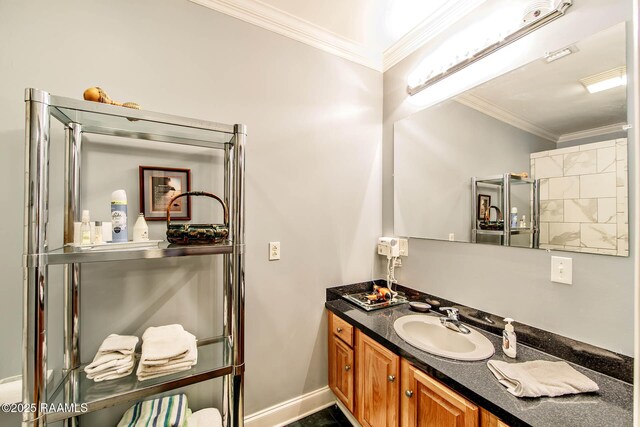 178 Flounder Ct, Dulac, LA 70353 - bathroom featuring vanity, crown molding, and baseboards