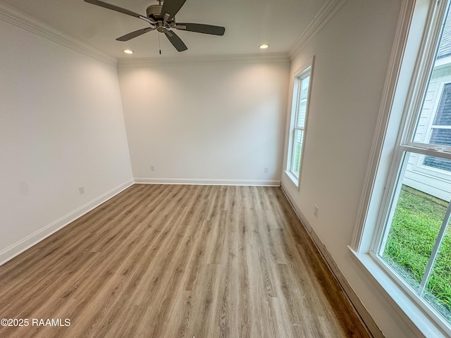 305 Berchman Oaks Dr, Lafayette, LA 70506 - spare room featuring healthy amount of natural light, wood finished floors, crown molding, baseboards, and recessed lighting