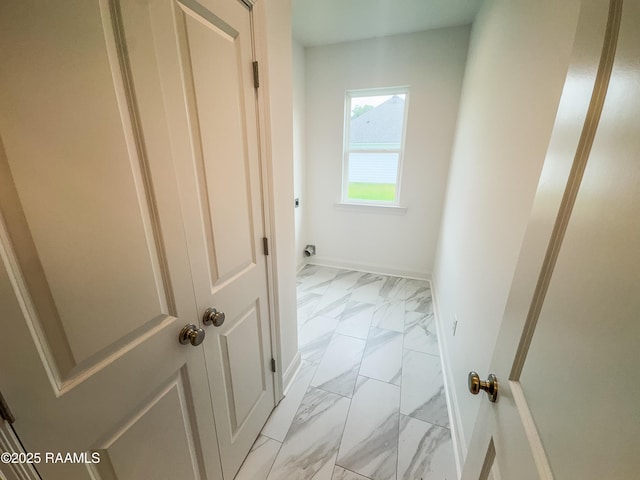 305 Berchman Oaks Dr, Lafayette, LA 70506 - hall with light marble finish flooring and baseboards