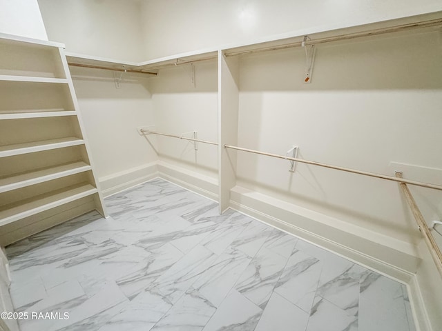 222 Timber Mill St, Lafayette, LA 70508 - spacious closet featuring marble look tile flooring