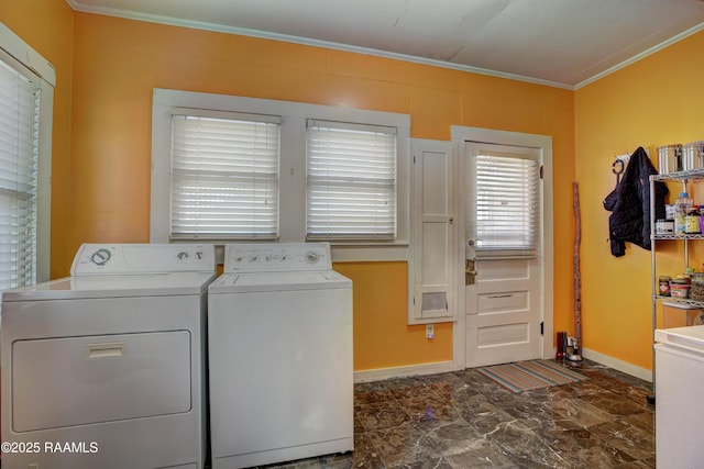 519 Mudd Ave, Lafayette, LA 70501 - washroom with washer and clothes dryer, ornamental molding, and baseboards