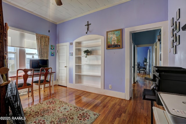519 Mudd Ave, Lafayette, LA 70501 - office space with baseboards, wood finished floors, a ceiling fan, ornamental molding, and built in shelves