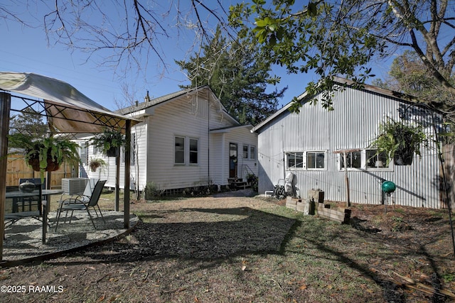 519 Mudd Ave, Lafayette, LA 70501 - rear view of property with a gazebo, a patio, and cooling unit