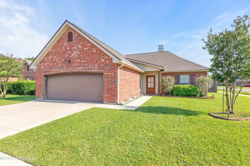 100 Soaring Cv, Carencro, LA 70520 - view of front of property with a garage, brick siding, concrete driveway, a front lawn, and roof with shingles