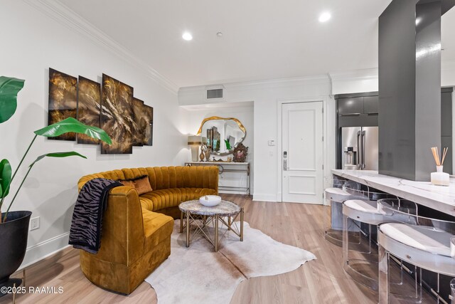 302 Richland Ave Unit 207C, Lafayette, LA 70508 - living room featuring ornamental molding, baseboards, recessed lighting, and light wood-style floors