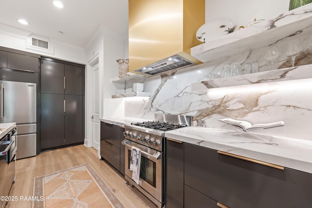 302 Richland Ave Unit 207C, Lafayette, LA 70508 - kitchen featuring stainless steel appliances, custom range hood, crown molding, light wood-type flooring, and modern cabinets