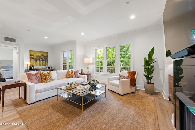 302 Richland Ave Unit 207C, Lafayette, LA 70508 - living room with light wood-style flooring, recessed lighting, crown molding, and baseboards