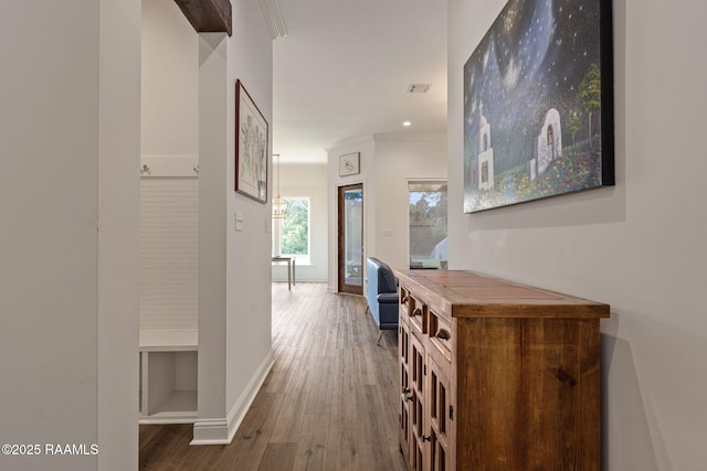 308 Manor House Ln, Lafayette, LA 70507 - corridor featuring wood finished floors, baseboards, and crown molding
