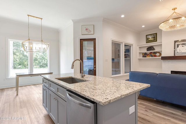 308 Manor House Ln, Lafayette, LA 70507 - kitchen with a chandelier, stainless steel dishwasher, a sink, ornamental molding, and light wood-style flooring