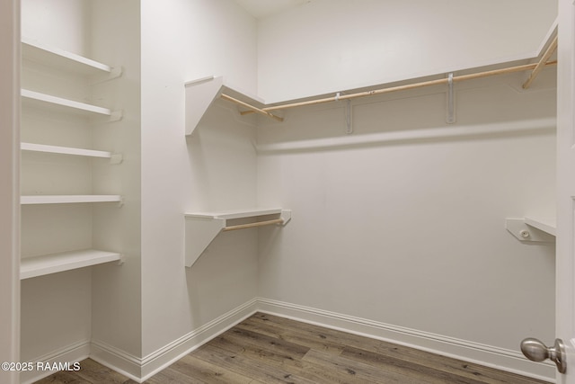 308 Manor House Ln, Lafayette, LA 70507 - spacious closet featuring wood finished floors