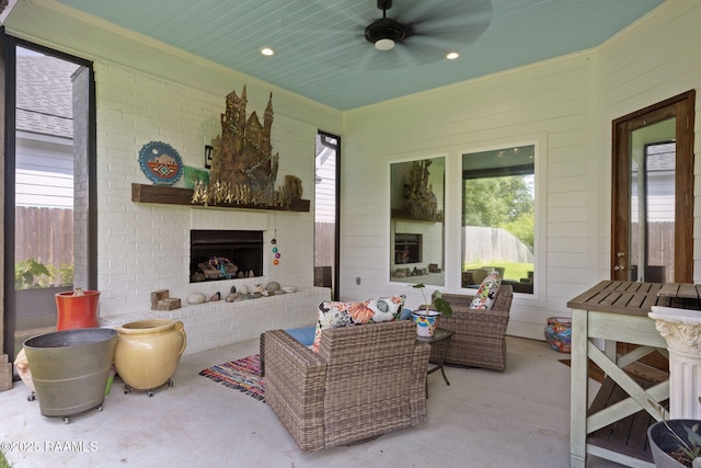 308 Manor House Ln, Lafayette, LA 70507 - view of patio with an outdoor living space with a fireplace and a ceiling fan