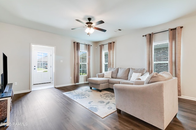 118 Barnet Ct, Lafayette, LA 70507 - living area with a ceiling fan, dark wood-style floors, and baseboards