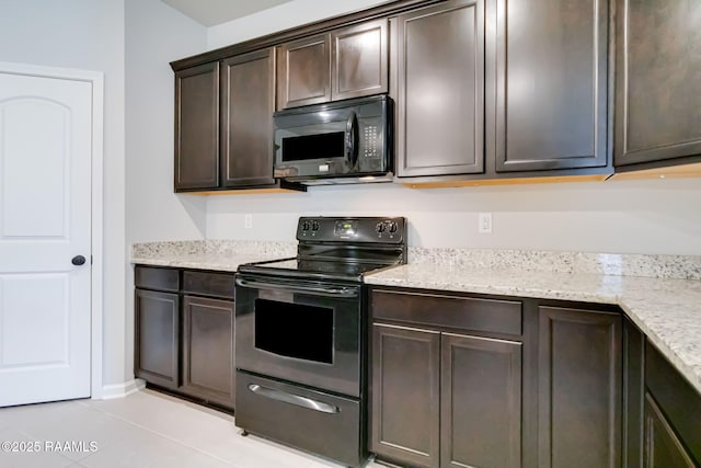 118 Barnet Ct, Lafayette, LA 70507 - kitchen with black appliances, dark brown cabinets, light tile patterned floors, and light stone counters