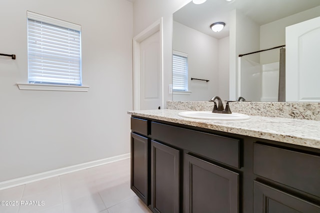 118 Barnet Ct, Lafayette, LA 70507 - full bath featuring vanity, tile patterned flooring, a shower, and baseboards