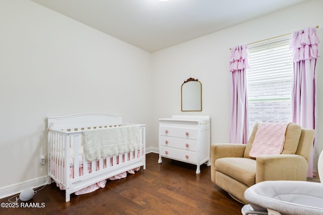 311 Victoria Lights Ln, Broussard, LA 70518 - bedroom featuring wood finished floors, a nursery area, and baseboards