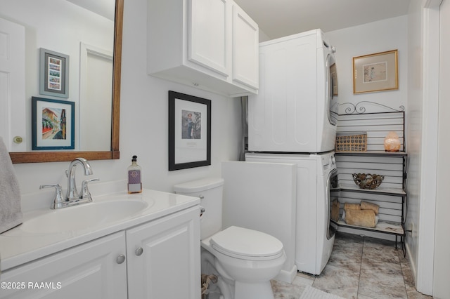 113 Templeton Dr, Lafayette, LA 70508 - bathroom with estacked washer and dryer, vanity, and toilet