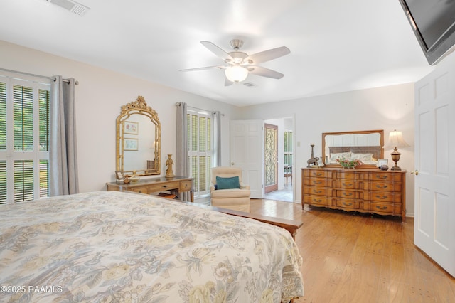 113 Templeton Dr, Lafayette, LA 70508 - bedroom featuring multiple windows, light wood-style flooring, and ceiling fan
