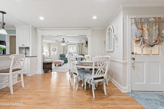 507 W Laodis St, Delcambre, LA 70528 - dining space with ornate columns, a ceiling fan, light wood finished floors, ornamental molding, and recessed lighting