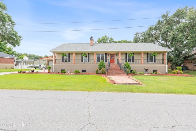507 W Laodis St, Delcambre, LA 70528 - ranch-style home featuring a front yard, a chimney, covered porch, and a garage
