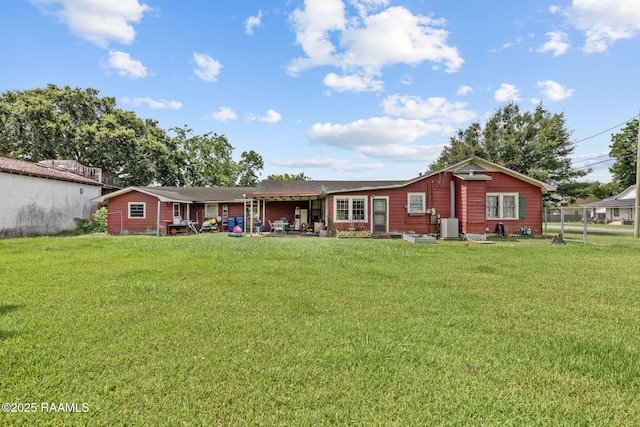 408 Section Ave, Rayne, LA 70578 - rear view of house with a yard and a patio area