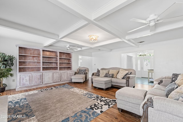 8001 Alpha Rd, Abbeville, LA 70510 - living area featuring a ceiling fan, beamed ceiling, wood finished floors, coffered ceiling, and crown molding