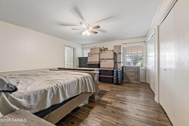 8001 Alpha Rd, Abbeville, LA 70510 - bedroom with wood finished floors and ceiling fan