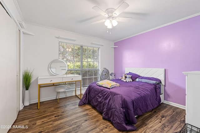8001 Alpha Rd, Abbeville, LA 70510 - bedroom featuring wood finished floors, crown molding, a ceiling fan, and baseboards