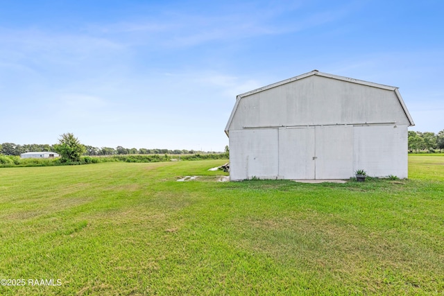 8001 Alpha Rd, Abbeville, LA 70510 - view of barn with a lawn