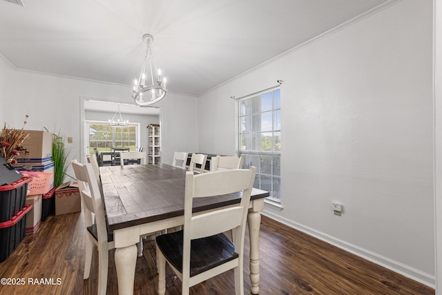 8001 Alpha Rd, Abbeville, LA 70510 - dining area with a chandelier, wood finished floors, baseboards, and ornamental molding