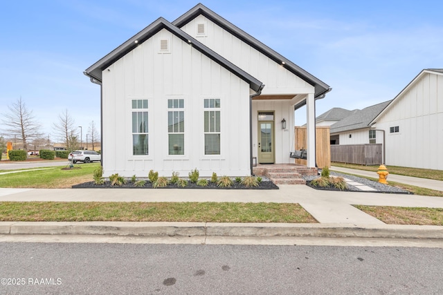 201 Lake Crest Ln, Youngsville, LA 70592 - modern inspired farmhouse with board and batten siding
