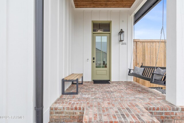 201 Lake Crest Ln, Youngsville, LA 70592 - entrance to property featuring board and batten siding