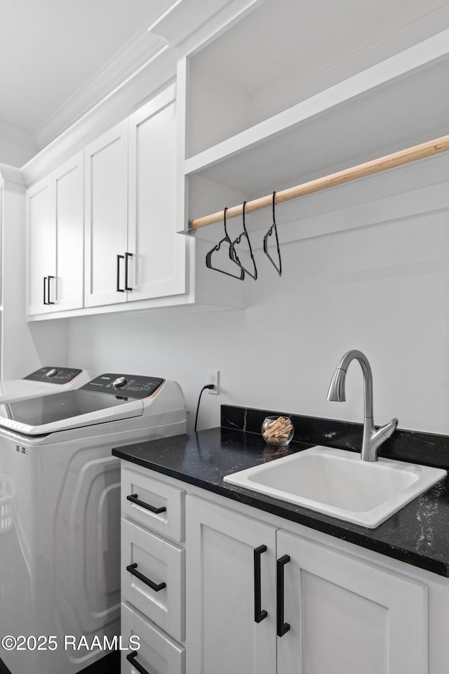 201 Lake Crest Ln, Youngsville, LA 70592 - laundry area with cabinet space, washing machine and dryer, and crown molding
