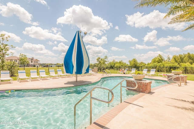 201 Lake Crest Ln, Youngsville, LA 70592 - community pool with a patio