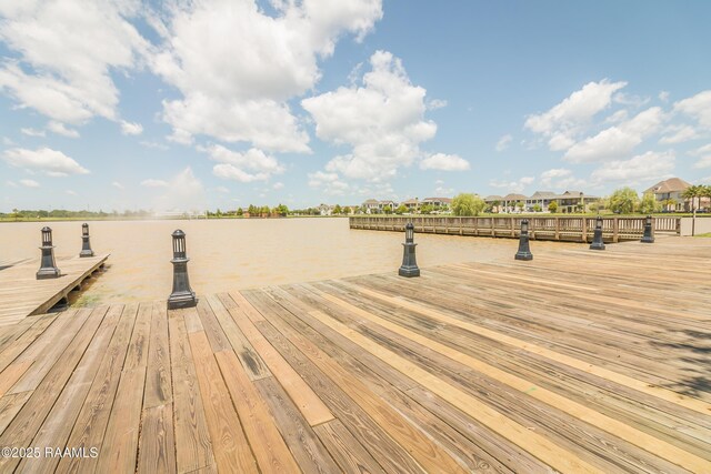201 Lake Crest Ln, Youngsville, LA 70592 - view of home's community featuring a dock, a water view, and a residential view