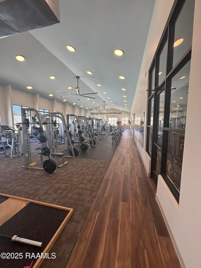 201 Lake Crest Ln, Youngsville, LA 70592 - exercise room featuring healthy amount of natural light, recessed lighting, lofted ceiling, wood finished floors, and ceiling fan