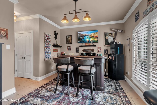 107 Ace Ln, Lafayette, LA 70506 - indoor dry bar featuring light tile patterned flooring, crown molding, and decorative light fixtures